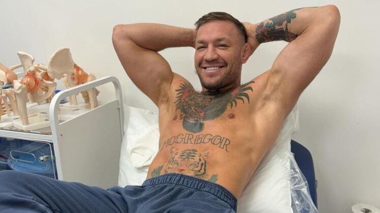 Conor McGregor resting on bed