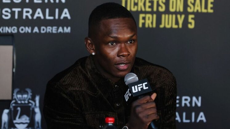 Israel Adesanya talking on mic