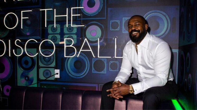 Jon Jones sitting in a club