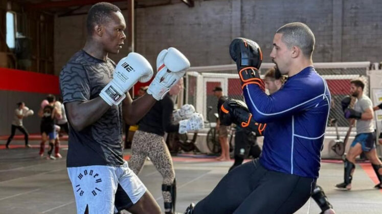 Robert Whittaker spars Israel Adesanya